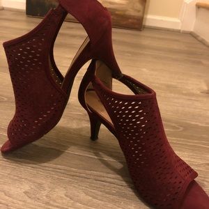 Burgundy stilettos in 2 and half inch heels.